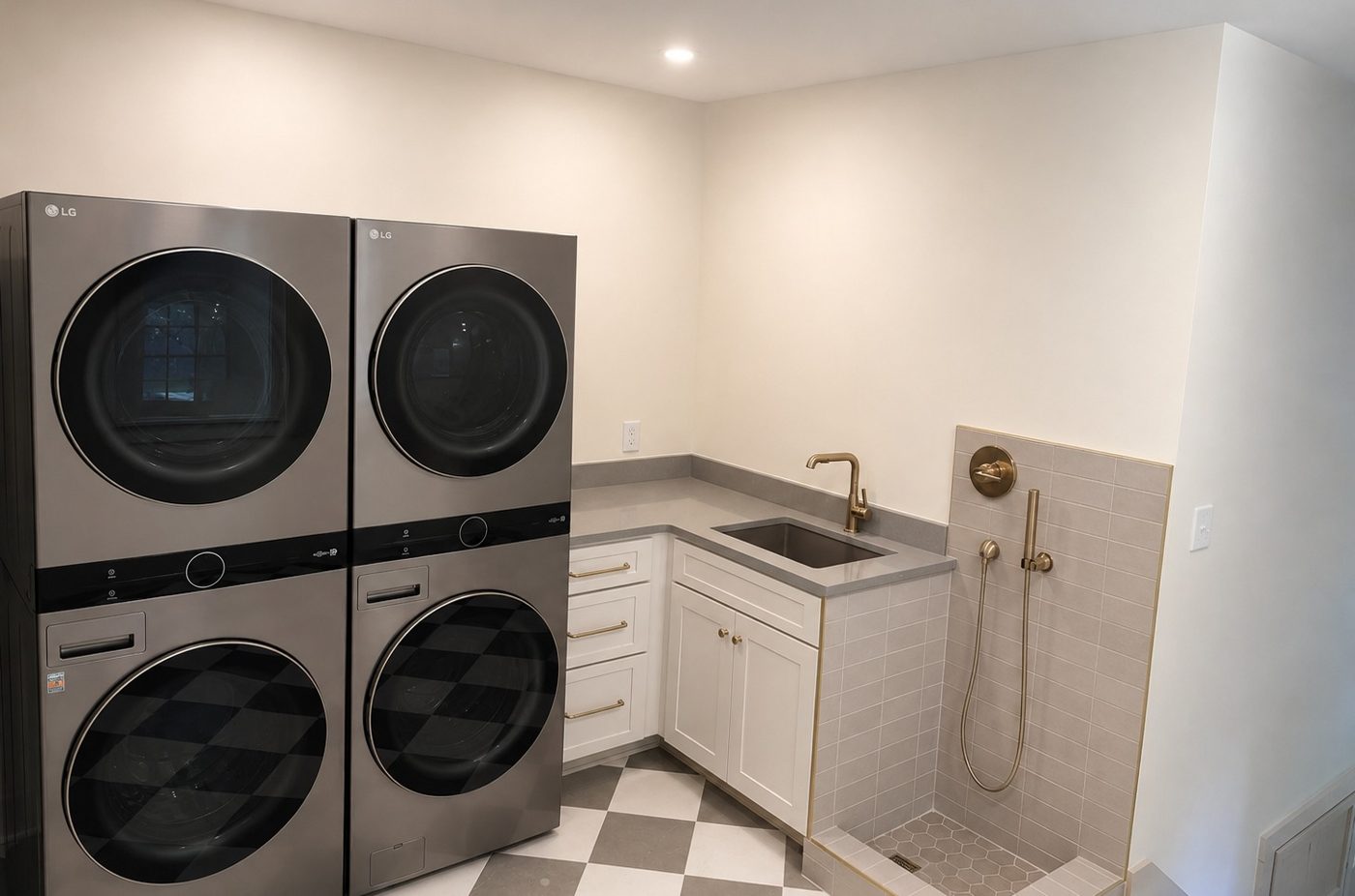 Laundry with stacked units and dog wash